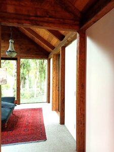 Interior Cypress PostsCypress posts feature throughout this house giving a pleasing cohesive effect.
